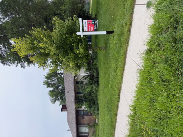 Residential real estate sign installation in Highland, Indiana