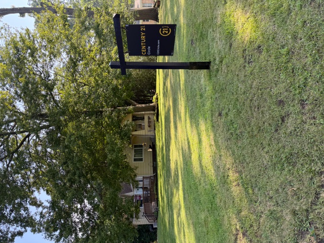 Residential real estate sign installation in Michigan City, Indiana