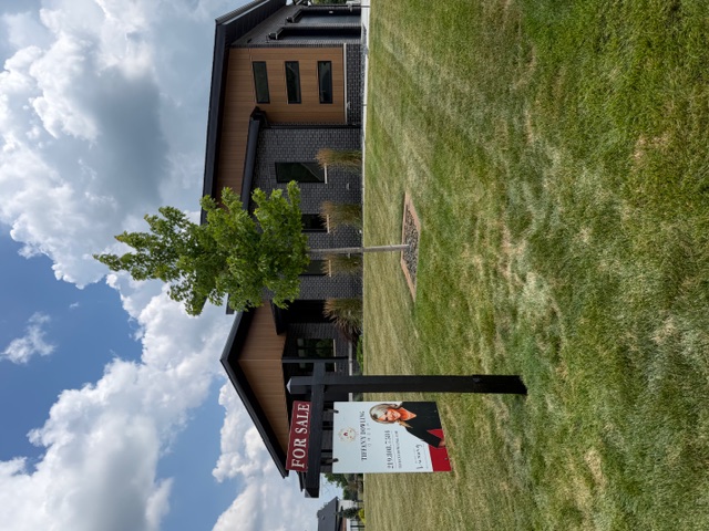 Luxury residential real estate sign and rider installation in Lowell, Indiana
